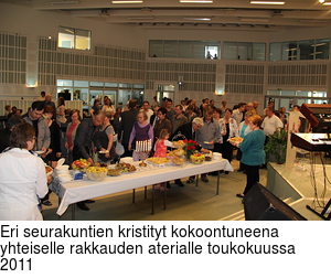 Eri seurakuntien kristityt kokoontuneena yhteiselle rakkauden aterialle toukokuussa 2011